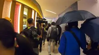 Protesters attack a Genki Sushi restaurant in Yuen Long
