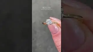 Round cut engagement ring in a hidden halo