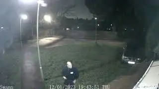 Another police officer taking photos of my side window and house. It's not write  ?