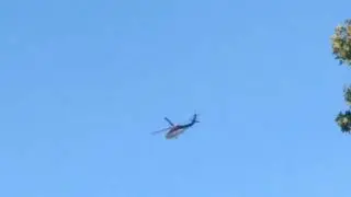 Sikorsky UH-60A Firehawk helicopter flying over my house