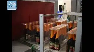 Foliebundelmachine Bierflessen verpakken Colruyt (Packsys - Novopac)