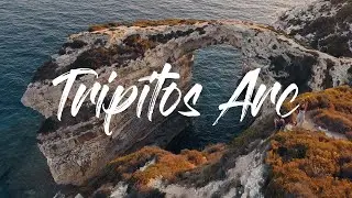 Amazing aerial view of Tripitos Natural Arch of Paxos Island, Greece | Drone Footage