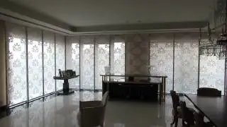 Motorized Fabric Panel System in a Living Room Corner