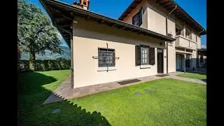 Splendida Casa Bifamigliare a Mandello con Vista Lago e Giardino Privato!