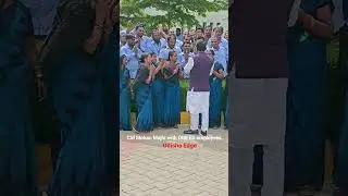 Chief minister Mohan Majhi with OMFED employees during an event