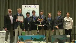 Local middle school students show off models of future cities in competition