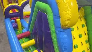 Adrenaline Rush Junior Obstacle Course Rental with a Middle Entrance from About to Bounce rentals