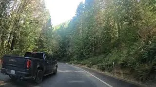 Driving along Lake Crescent in Olympic National Park west of Port Angeles, Washington
