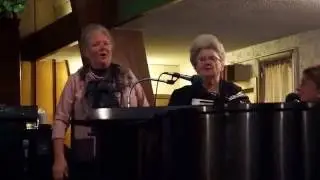 Grandma playing the accordion upside down