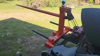Winch powered Round bale mover for the redneck side by side