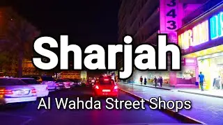 Sharjah - Al Wahda Street shops at night