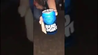 Girls flips hand backwards to grab drink