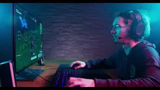 Gaming Stock Footage: Young adult playing video games online 4K | HD