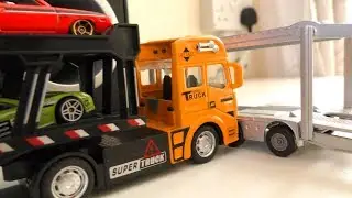 Various Hot Wheels Toy Cars Lading in Car Truck