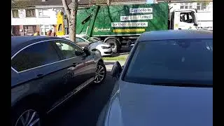 Greyhound Man collecting green bins 10/4/2025