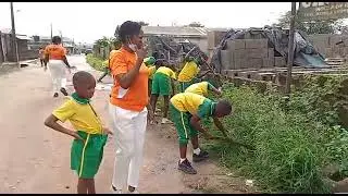 Brightview School Staff & children serving the Community with Street Cleaning