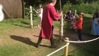 Abi and Charlie learning to sword fight at Warwick Castle back in 2014