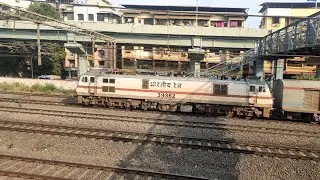 20954 Ahmedabad - Chennai SF Express with BZA WAP-7 Through Thakurli
