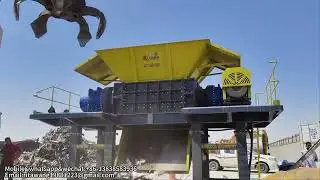 Metal scrap shredder for processing of mixed light iron, white goods and pre-shredded car shells