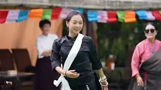 Чоу ли ли и команда танцуют тибетский танец янчхи