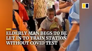 Elderly man in China begs to be let in to train station without Covid test