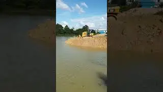 best dozer moving dirt into water