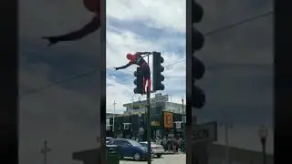 Spider-Man dancing on stop light