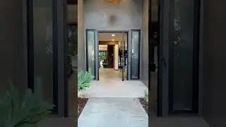Modern Pivot Door with Horizontal Slats fabricated by Rhino Steel Doors. Shipping from San Diego CA