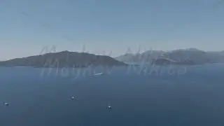 D-Log M. Marmaris, Turkey. Aerial drone panorama of Marmaris showing city, mountains, bay with ya...