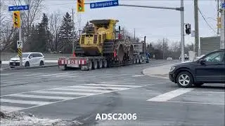 Cool Truck Loads 84 Landfill Compactor