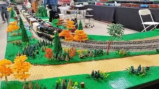 Lego trains running on NELUG's layout at Amherst Big E Model Train Show (Jan 2026)