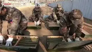 A north China unit uses laser EOD system to demonstrate the destruction of ammunition stocks