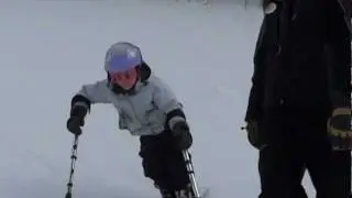Saylor skis with Wasatch Adaptive Sports at Snowbird