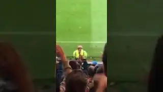 Oldham fans singing to a steward who looked like Boris Johnson at Rochdale. Credit: Bradley Knowles.