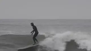 Mikey melchiorre Virginia Beach local pro longboarder /switch @ 1st street jetty