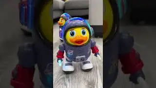 Dancing Space Duck Battery Operated Toy Figure w Side to Side Dancing Action, Flashing Lights, Music