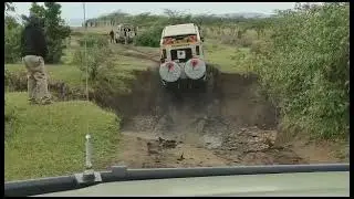Car crossing a river without any road,bridge in Kenya,Africa#car#tourism#kenya#africa#junglesafari