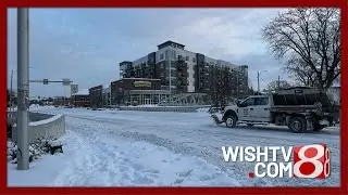 Indy DPW crews tackle snow-covered roads amid travel warning