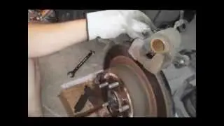 How to Replace rear brakes and rotors - Infiniti G35x 2008. Cute girl helps!