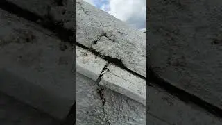 chimney casting concrete top cap & lead dressing over parapet wall.