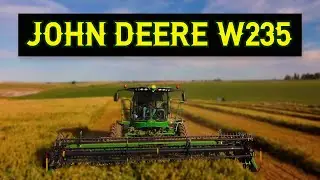 John Deere W235 With 525D Draper Header Swathing Organic Spring Wheat