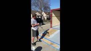 Putting down RUST-OLEUM Epoxy Shield to protect our Enclosed Trailer floor