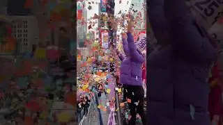 Walking in a confetti wonderland with @planetfitness! 💜💛🎉 #NYE #Confetti #NYC #TimesSquare