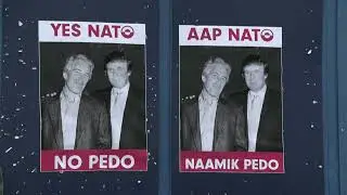 Locuitorii afișează bannere cu mesajul: 