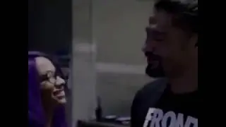 Roman reigns hug sasha banks backstage