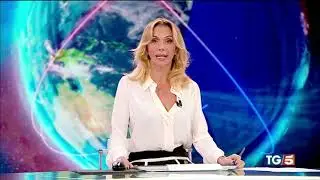 Simona Branchetti in slightly transparent white blouse