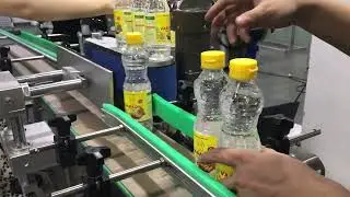 Test run edible oil PET bottle servo labeler for 400ml bottles
