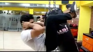 Punching bag hanging crunches