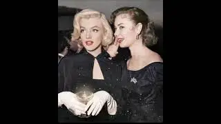 Marilyn Monroe with Mitzi Gaynor at the wedding of Sheila Graham's wedding in February 1953. Take 2.