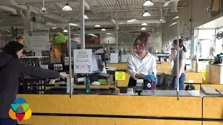 Glass barriers at the grocery checkout